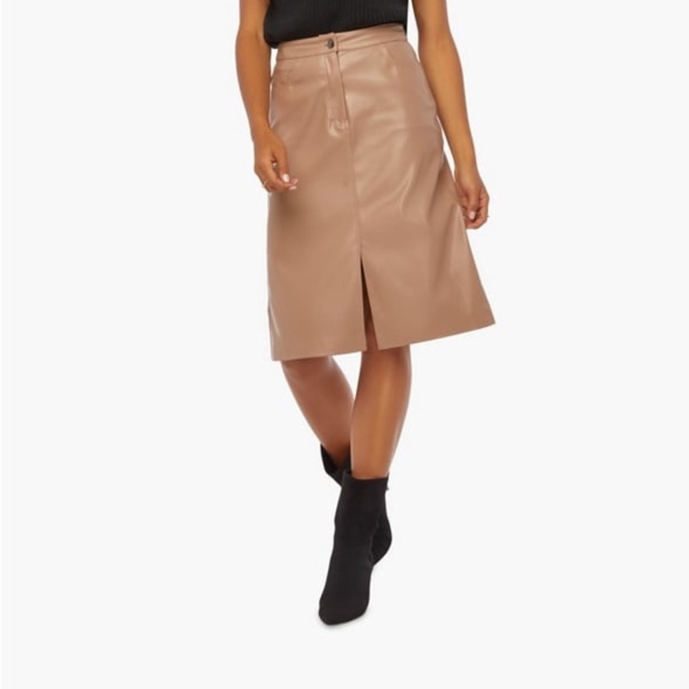Tan and brown faux leather skirt 
I never wear it. 
Pristine condition